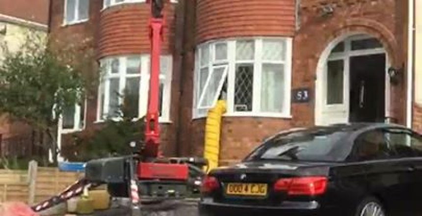 A log burner installation in Birmingham